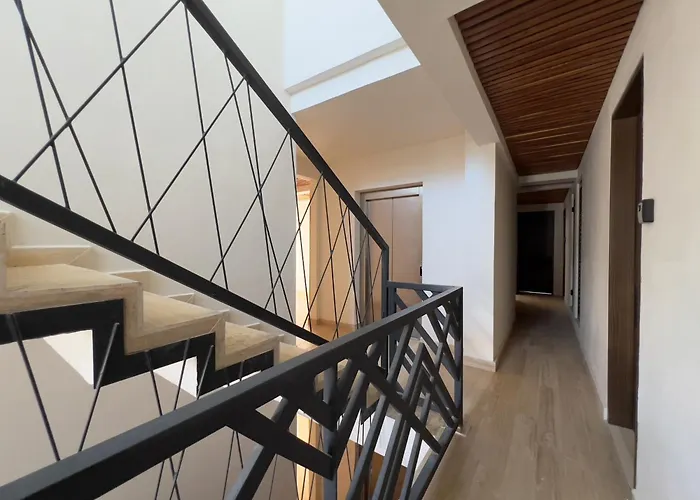 Unwind | Private Balcony & Rooftop Pools | Casago *